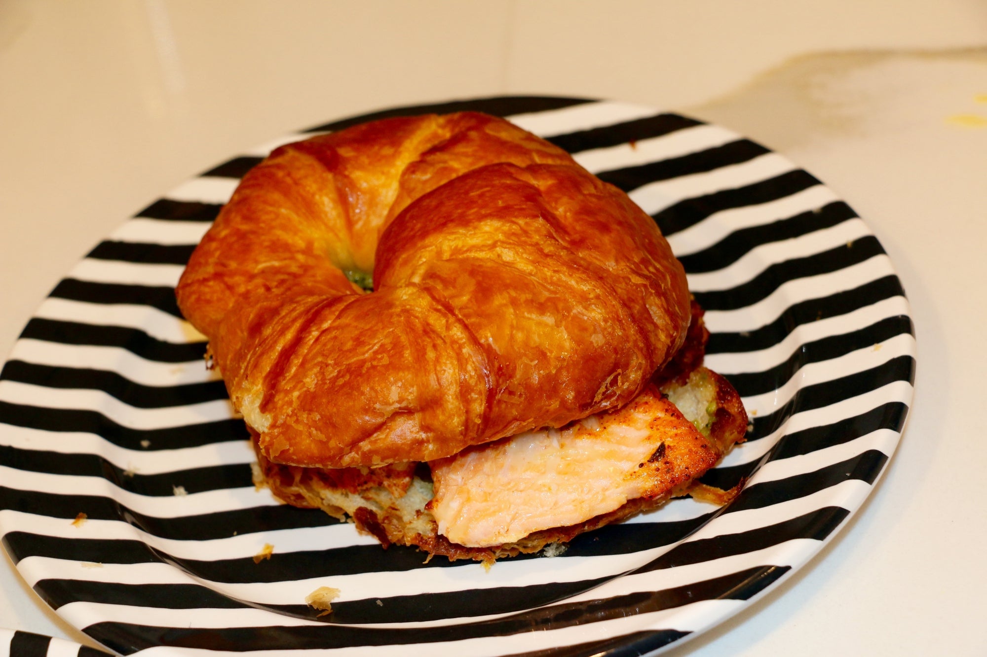 Salmon croissant sandwich
